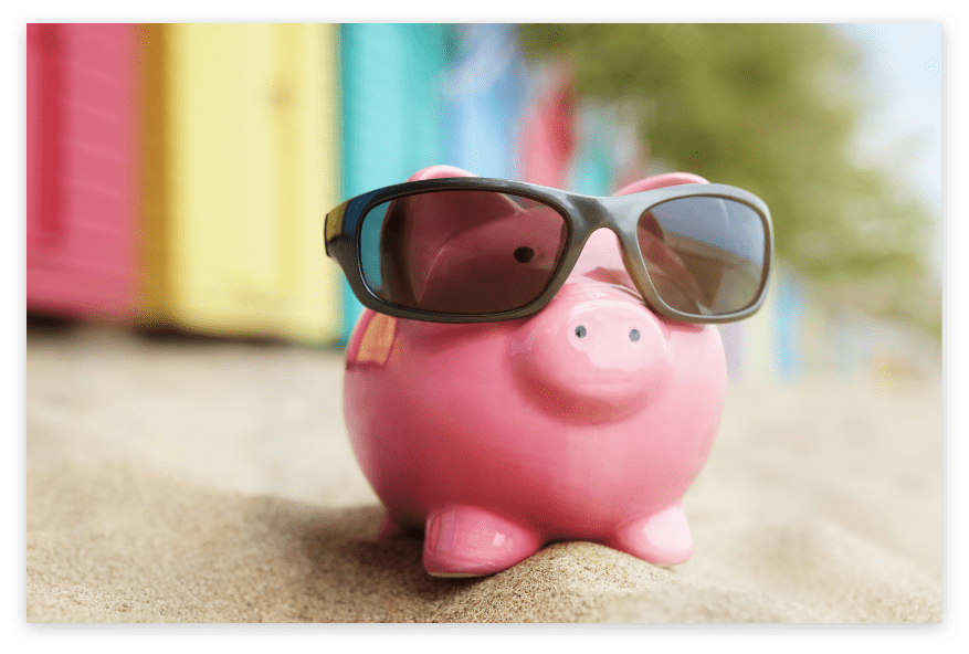 piggy-bank-on-beach-vacation-P8YZYNB